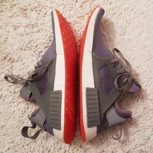 a very well taken care of Addidas sneakers